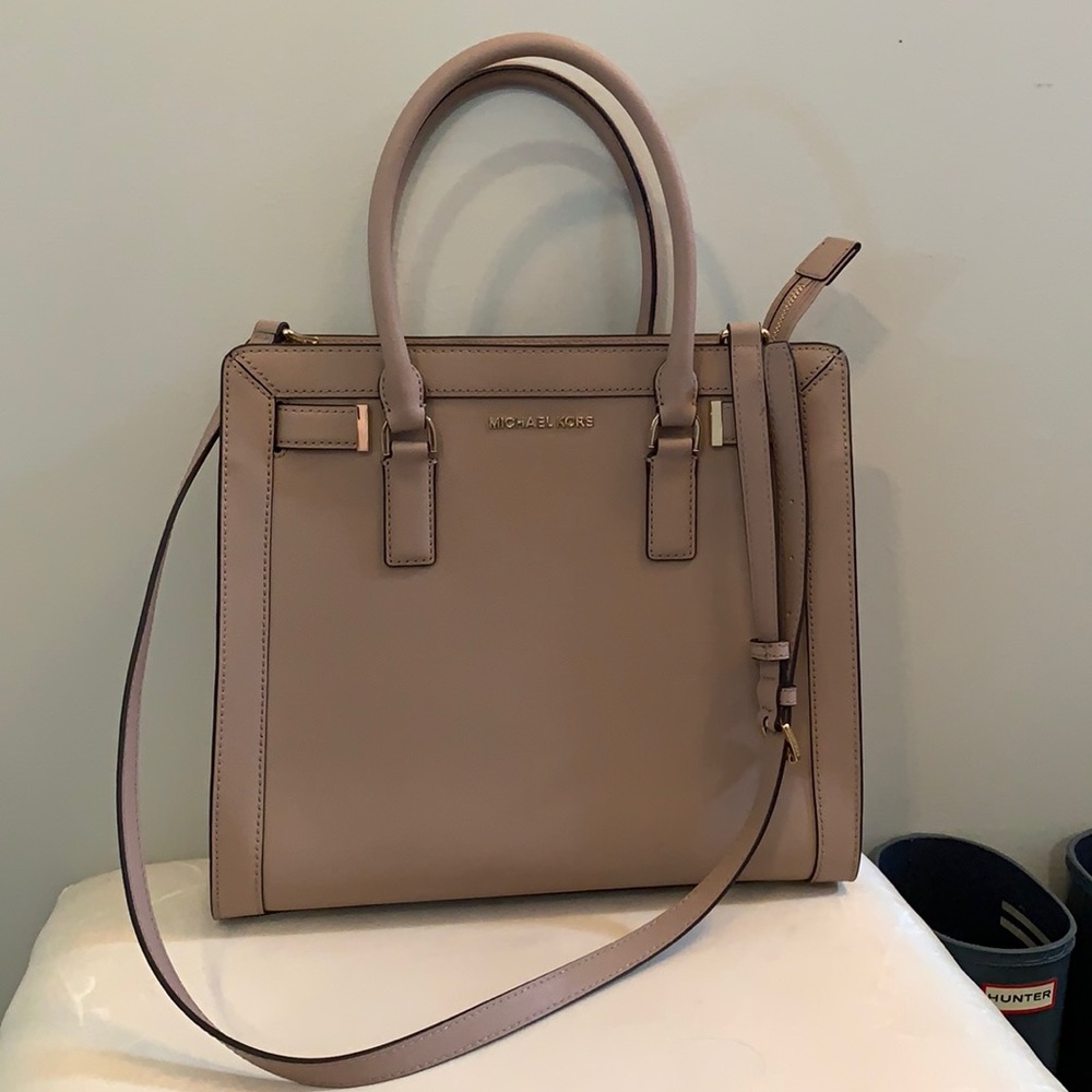 NEVER used. Michael Kors LARGE cross body